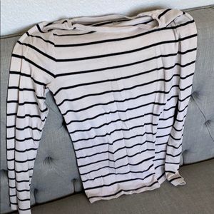 Gently used thin black and white stripped shirt.